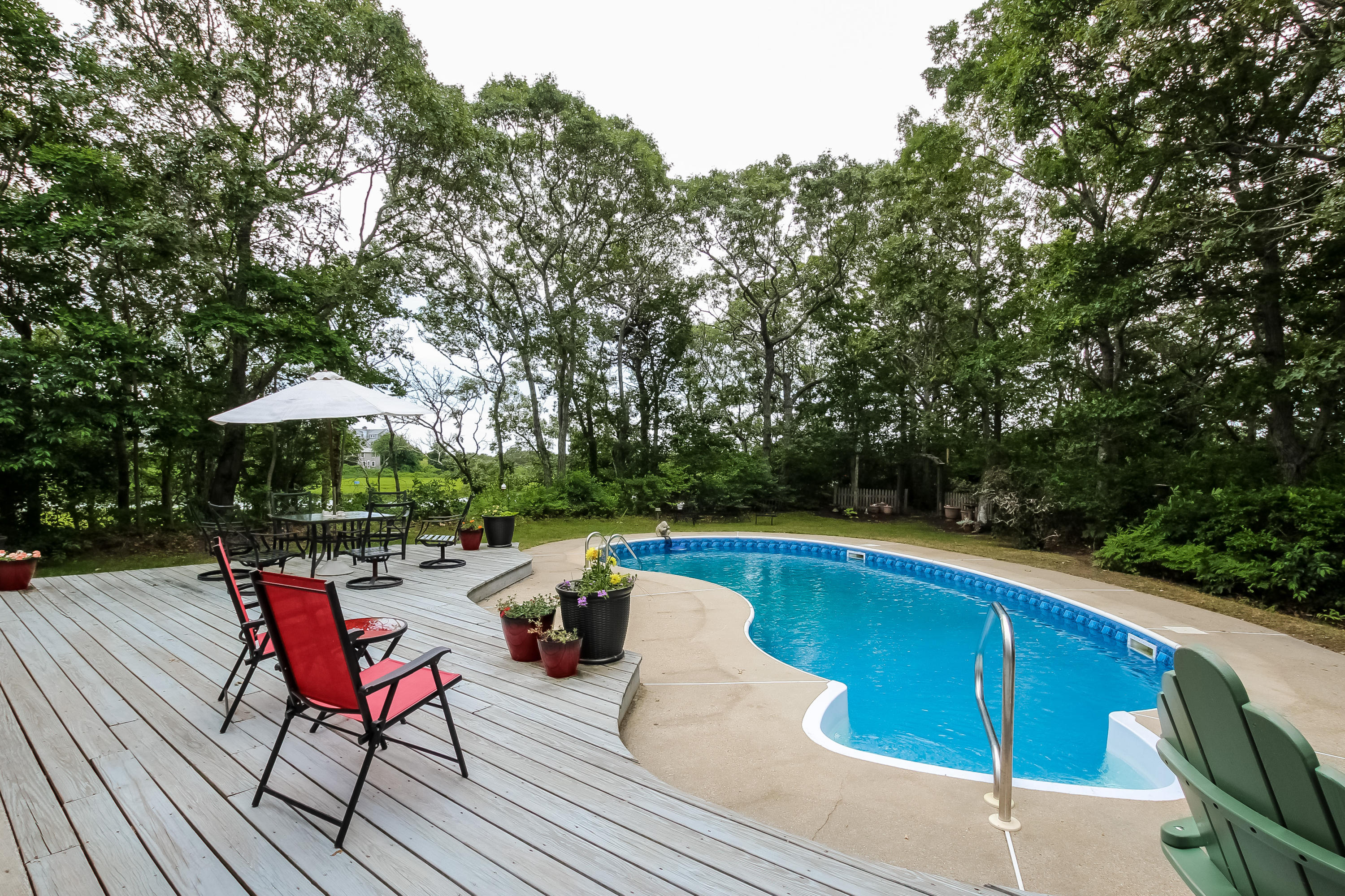 494 Elliott Road Centerville, MA 02632 - Photo 3 of 31 a view of swimming pool with seating space