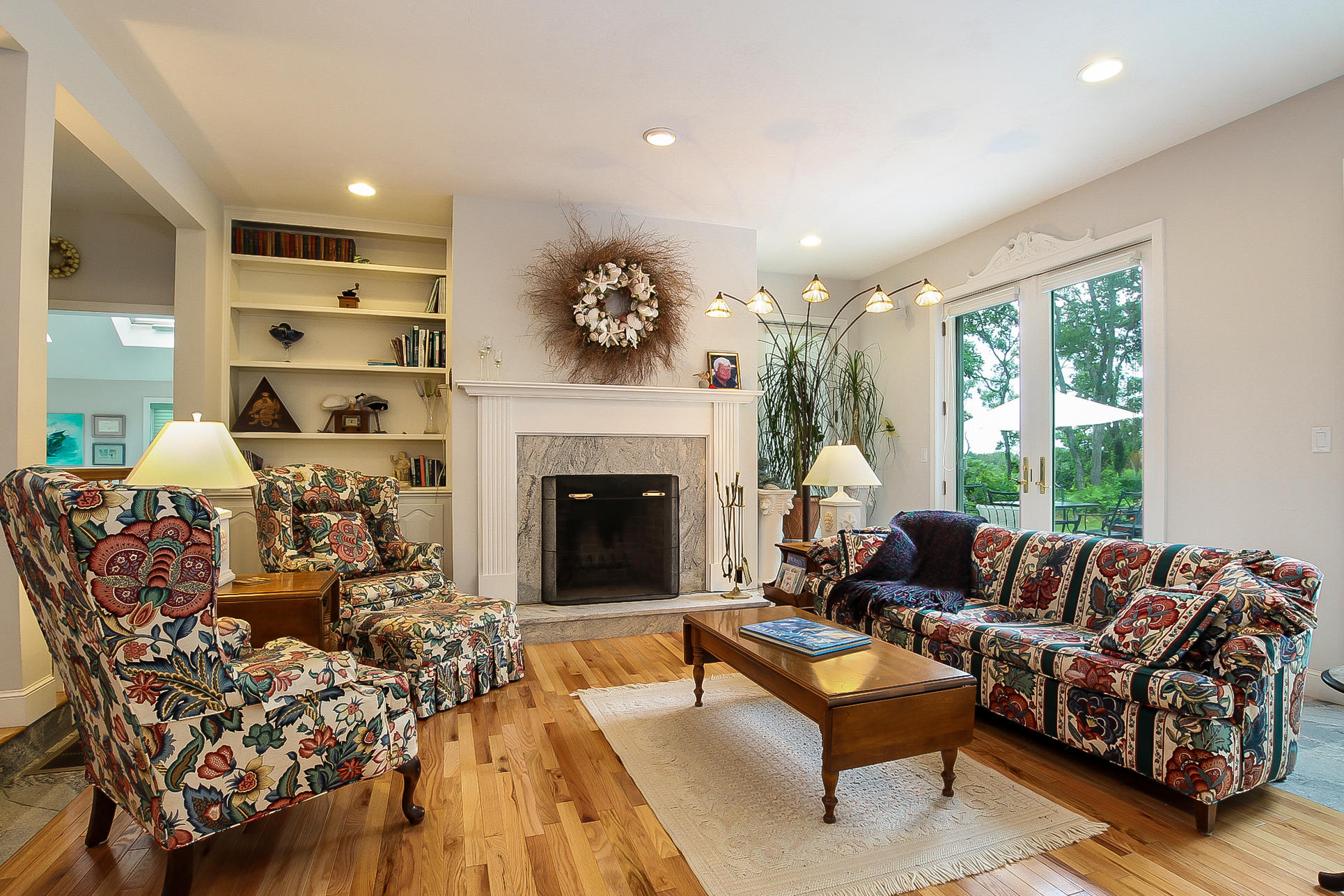 494 Elliott Road Centerville, MA 02632 - Photo 4 of 31 a living room with furniture and a fireplace