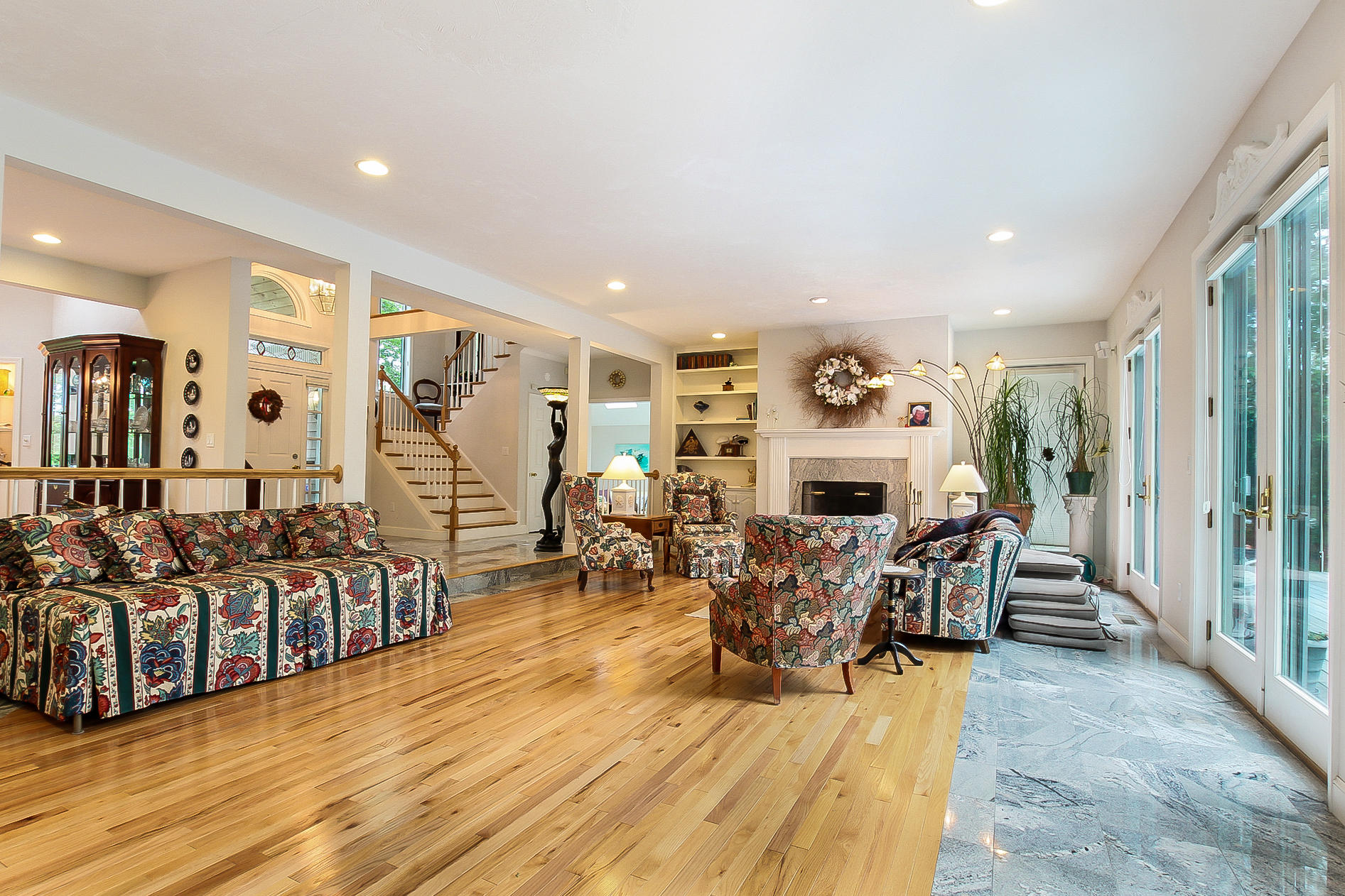 494 Elliott Road Centerville, MA 02632 - Photo 6 of 31 a living room with lots of furniture and gym equipment