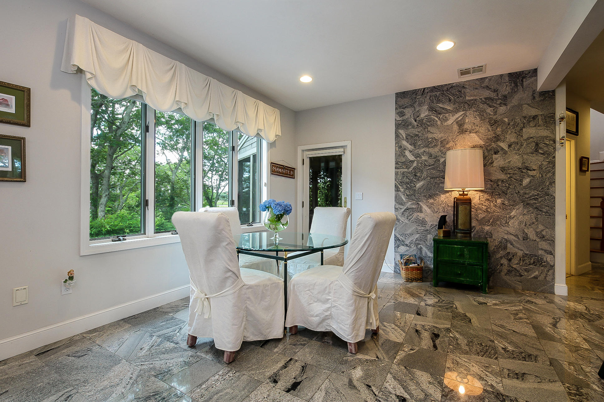 494 Elliott Road Centerville, MA 02632 - Photo 8 of 31 a view of a dining room with furniture window and outside view