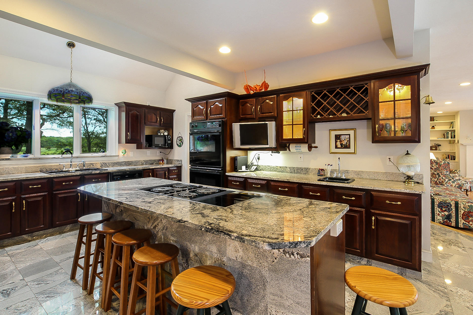 494 Elliott Road Centerville, MA 02632 - Photo 10 of 31 a kitchen with stainless steel appliances granite countertop a sink and a stove