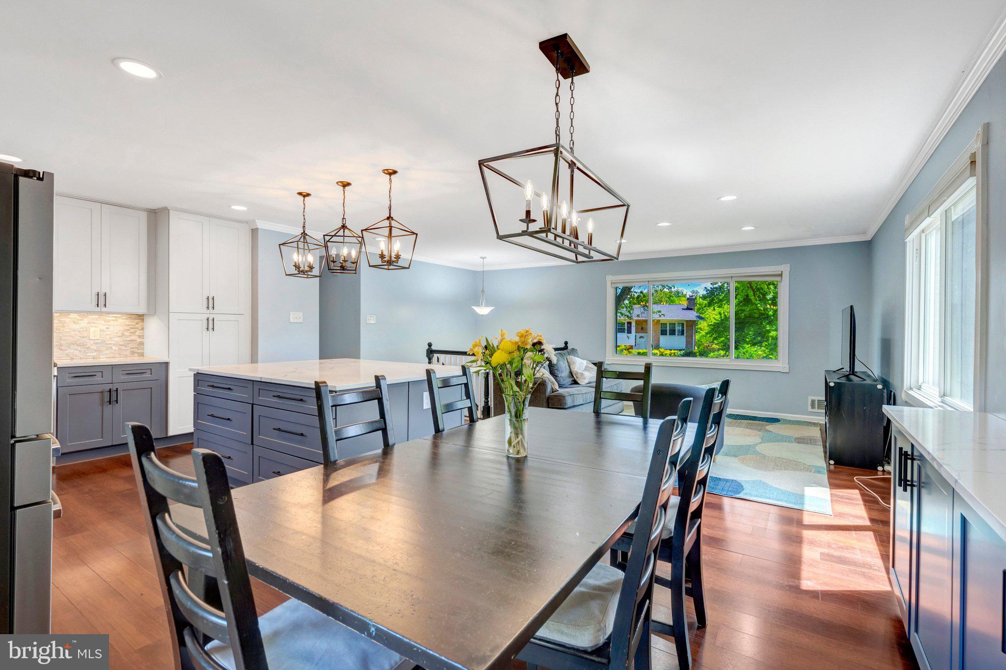 7212 Galgate Drive Springfield, VA 22153 - Photo 9 of 39 a view of a dining room with furniture window and wooden floor