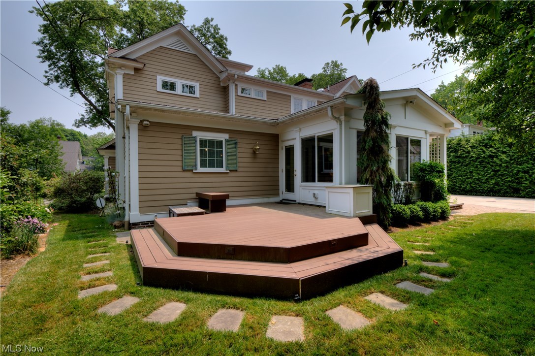2878 Brighton Road Cleveland, OH 44120 - Photo 34 of 35 Enjoy views of the beautifully landscaped yard and gardens from the fabulous sandstone portico in front, covered terrace and large composite deck
in back