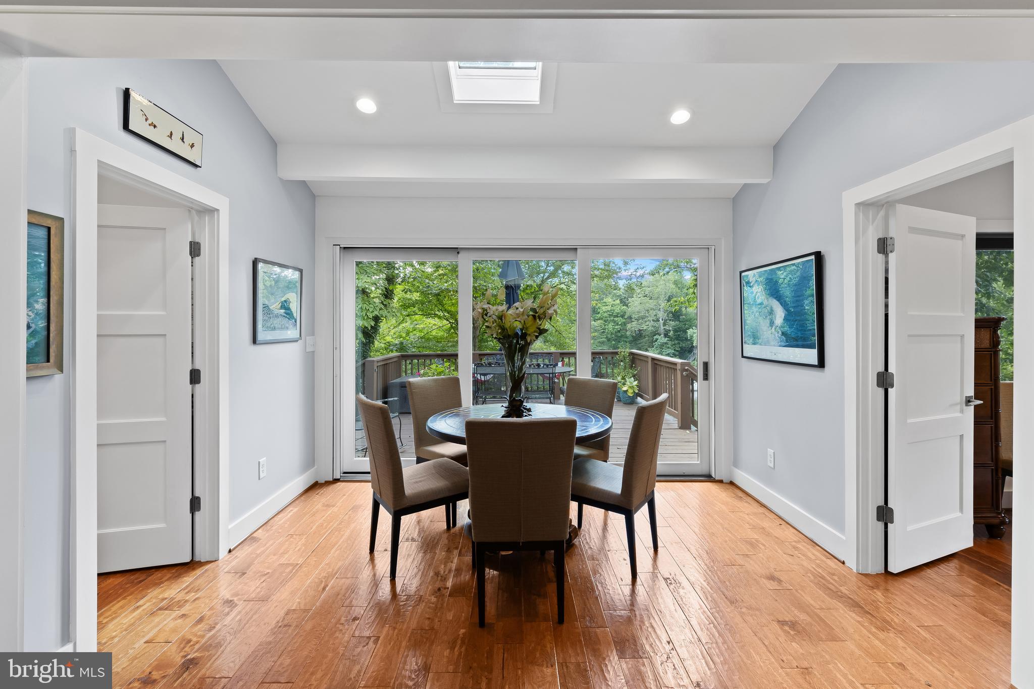 1428 Ravine Way Arnold, MD 21012 - Photo 10 of 43 a dining room with furniture window and wooden floor