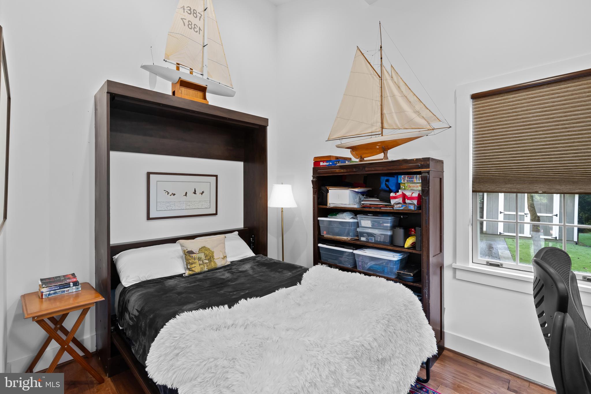 1428 Ravine Way Arnold, MD 21012 - Photo 17 of 43 a bedroom with a bed and a window