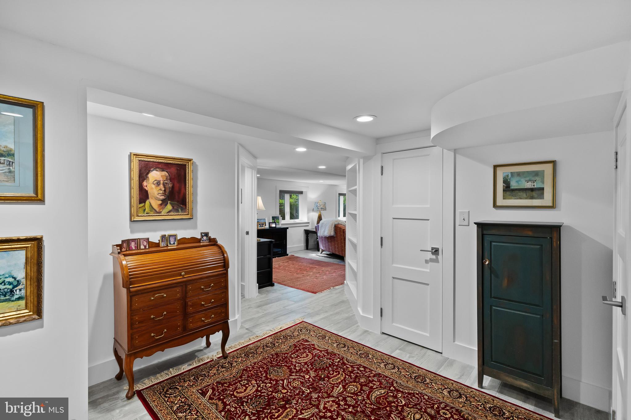 1428 Ravine Way Arnold, MD 21012 - Photo 19 of 43 a hallway with furniture and mirror