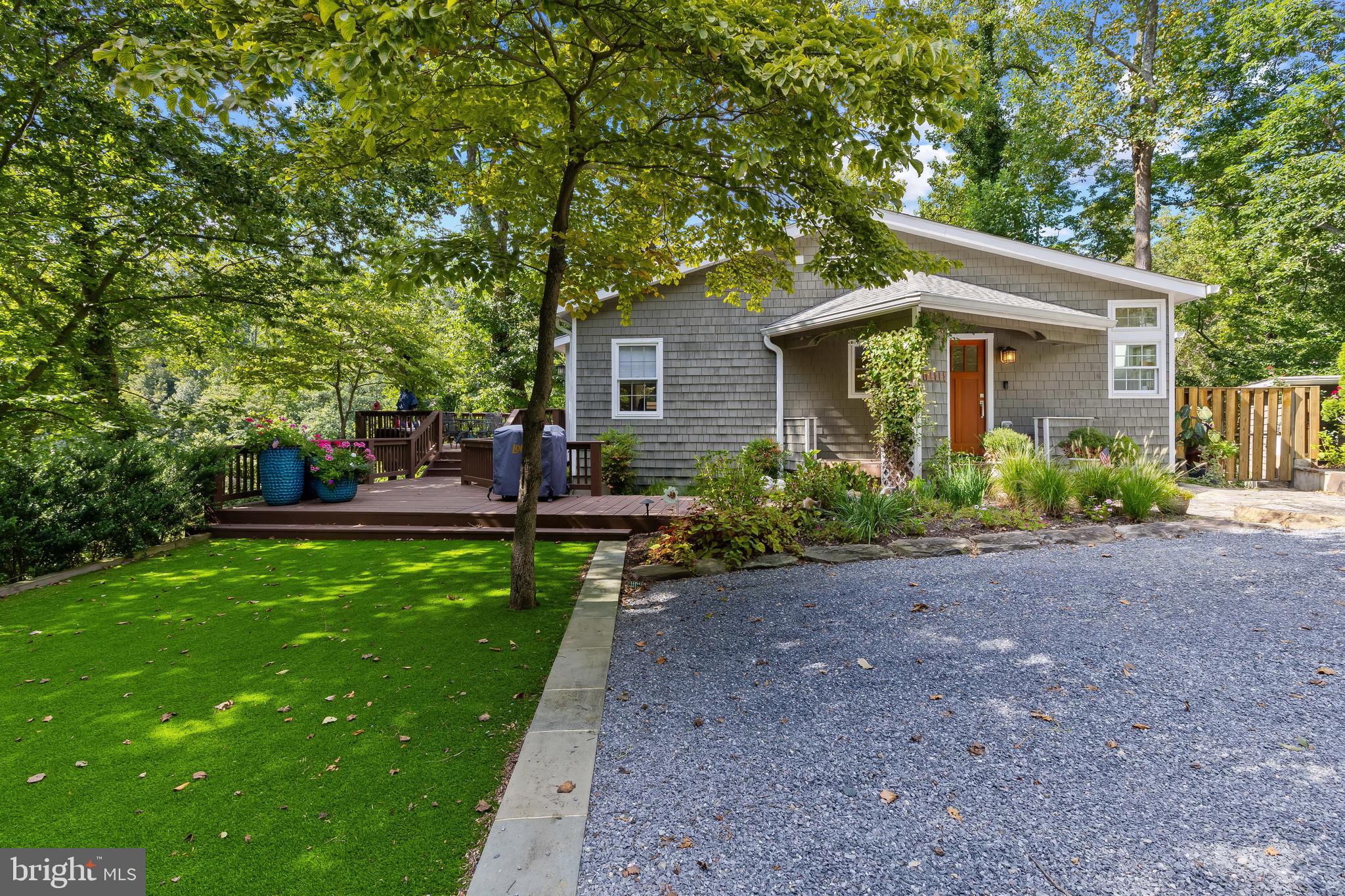 1428 Ravine Way Arnold, MD 21012 - Photo 2 of 43 a front view of a house with garden