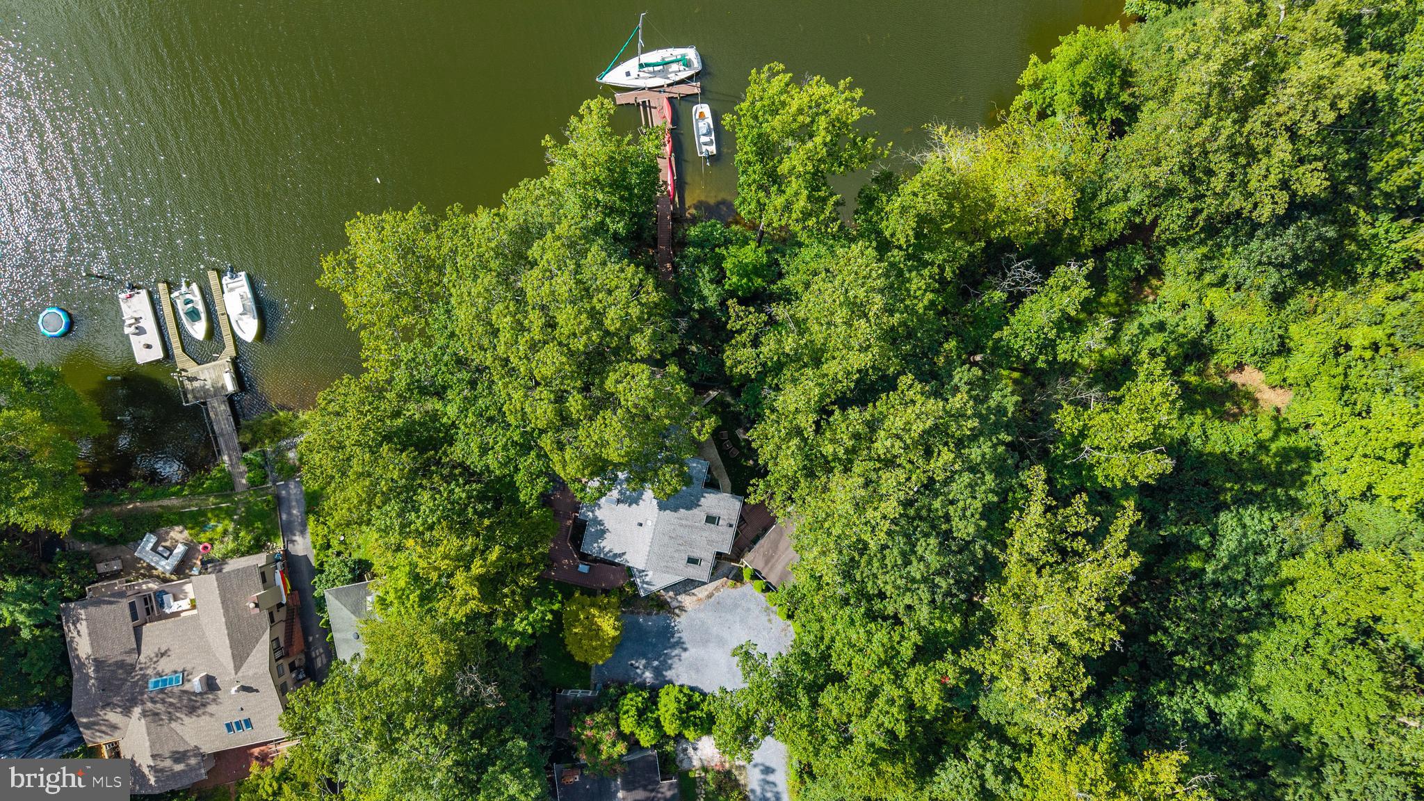 1428 Ravine Way Arnold, MD 21012 - Photo 28 of 43 an aerial view of a house with lots of trees