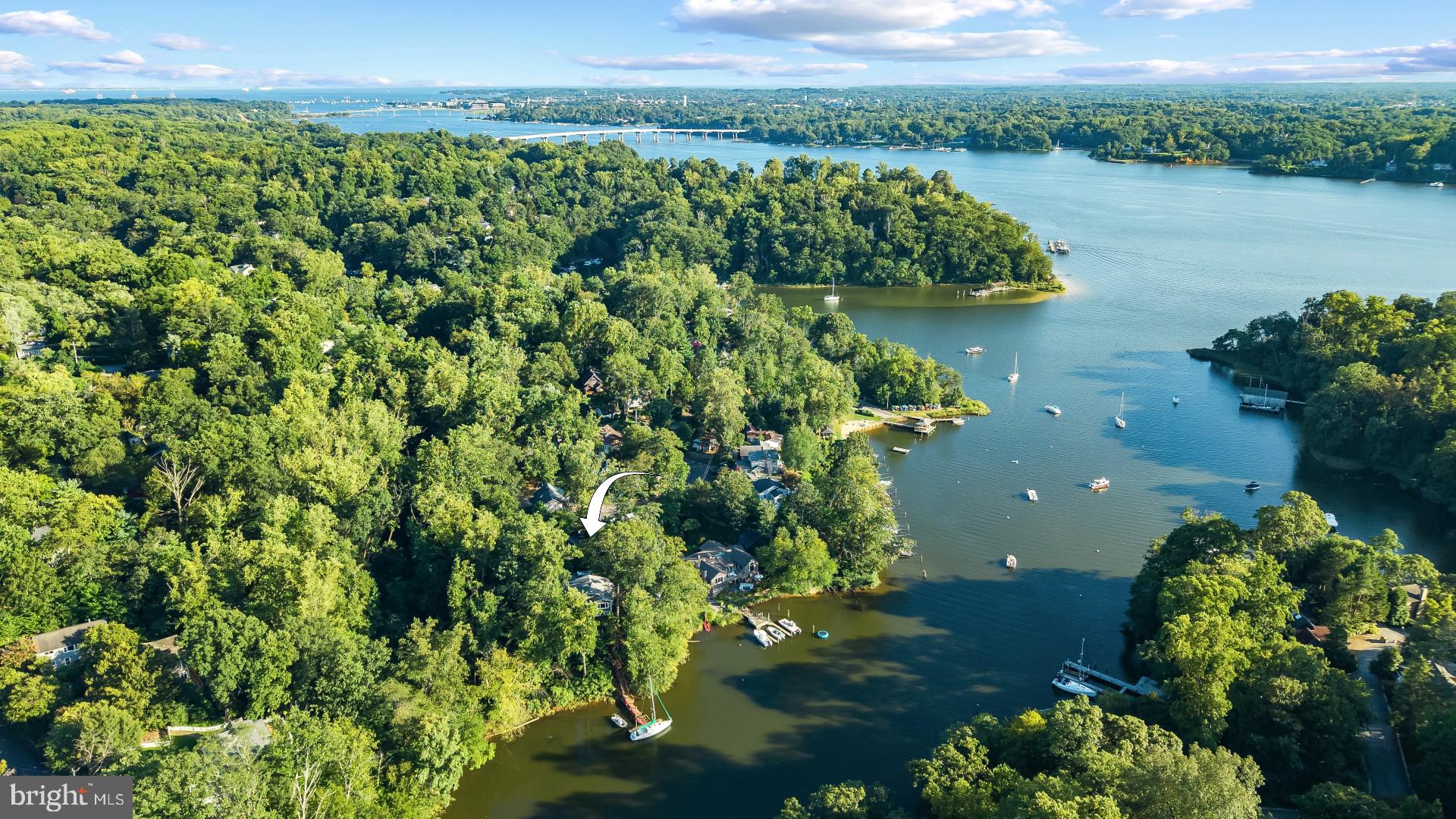 1428 Ravine Way Arnold, MD 21012 - Photo 33 of 43 a view of a lake with a yard