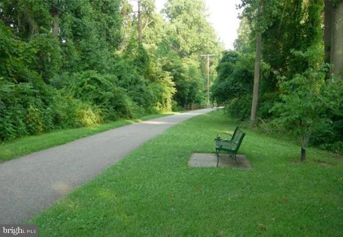 1428 Ravine Way Arnold, MD 21012 - Photo 41 of 43 a view of a garden with a bench