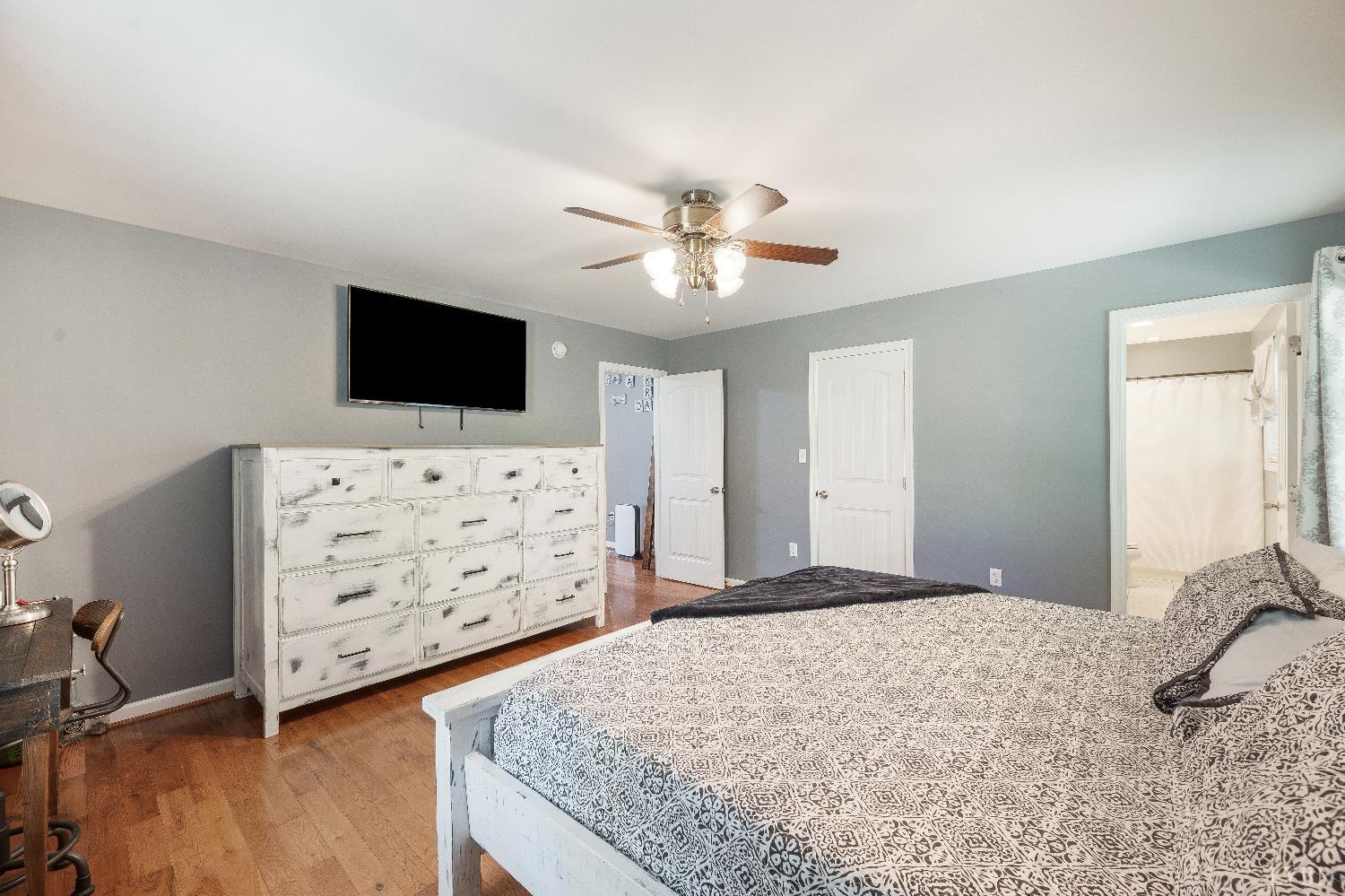 405 Marston Street Spout Spring, VA 24593 - Photo 15 of 58 a bedroom with a bed and a flat screen tv