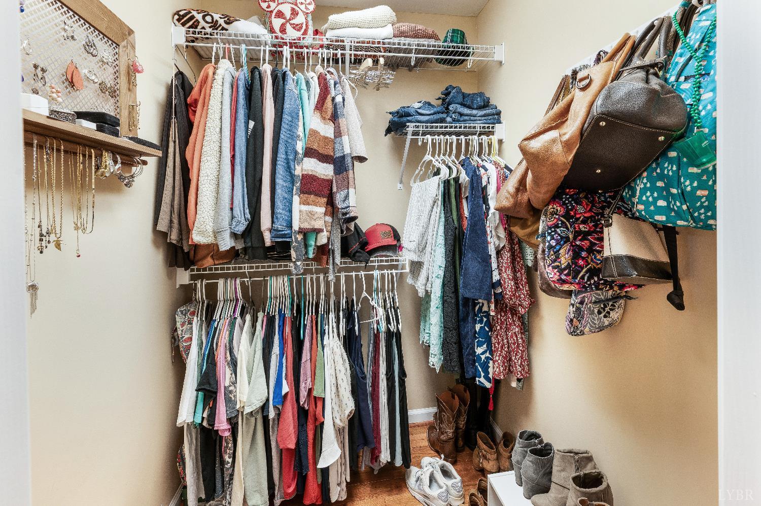 405 Marston Street Spout Spring, VA 24593 - Photo 18 of 58 a view of walk in closet with clothes