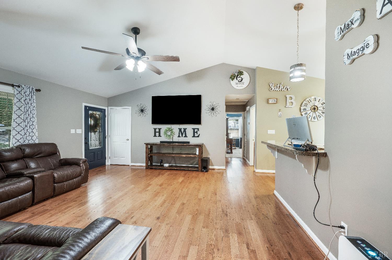 405 Marston Street Spout Spring, VA 24593 - Photo 19 of 58 a living room with furniture and a flat screen tv