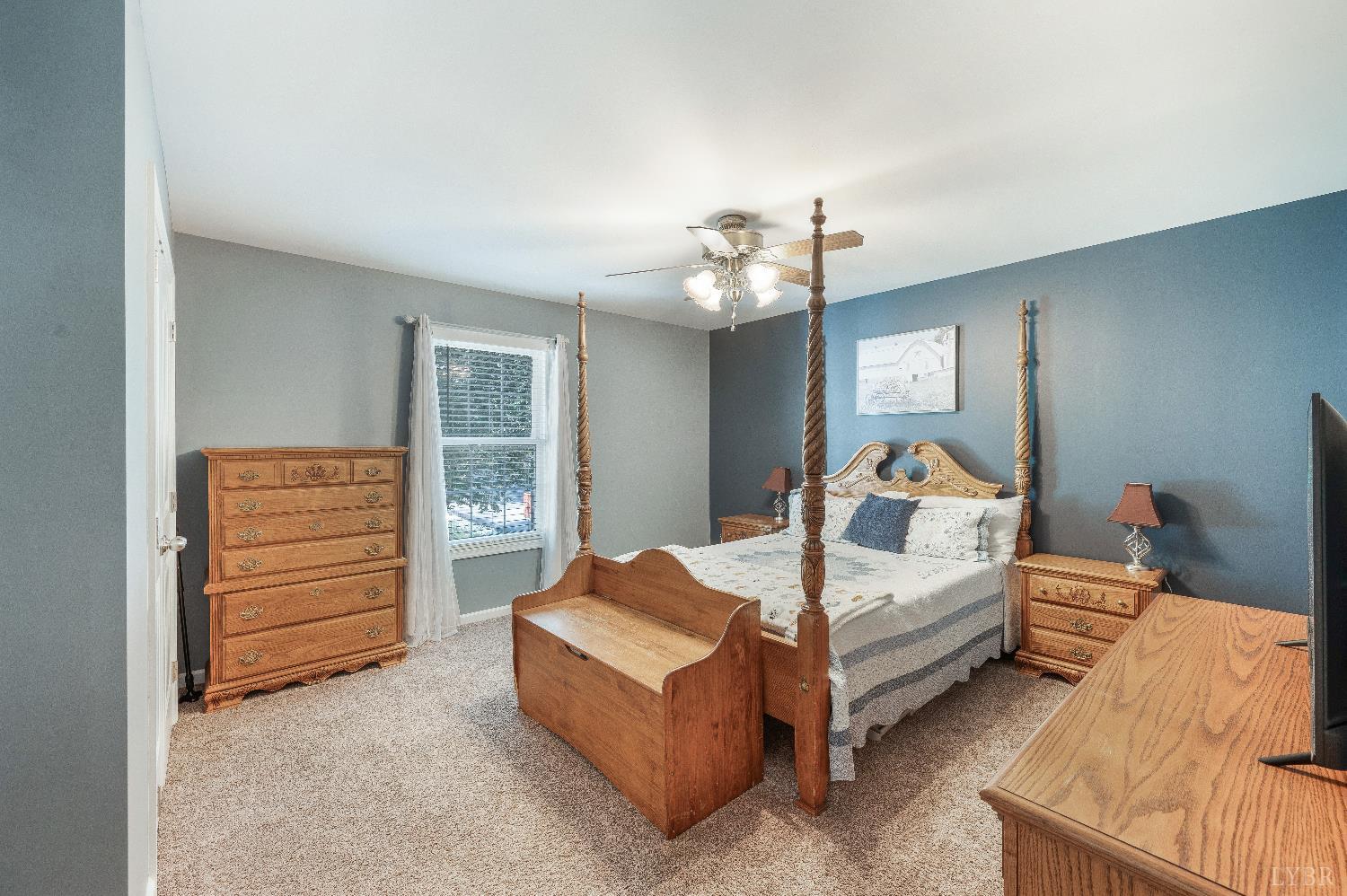 405 Marston Street Spout Spring, VA 24593 - Photo 20 of 58 a bed room with a bed and a chair