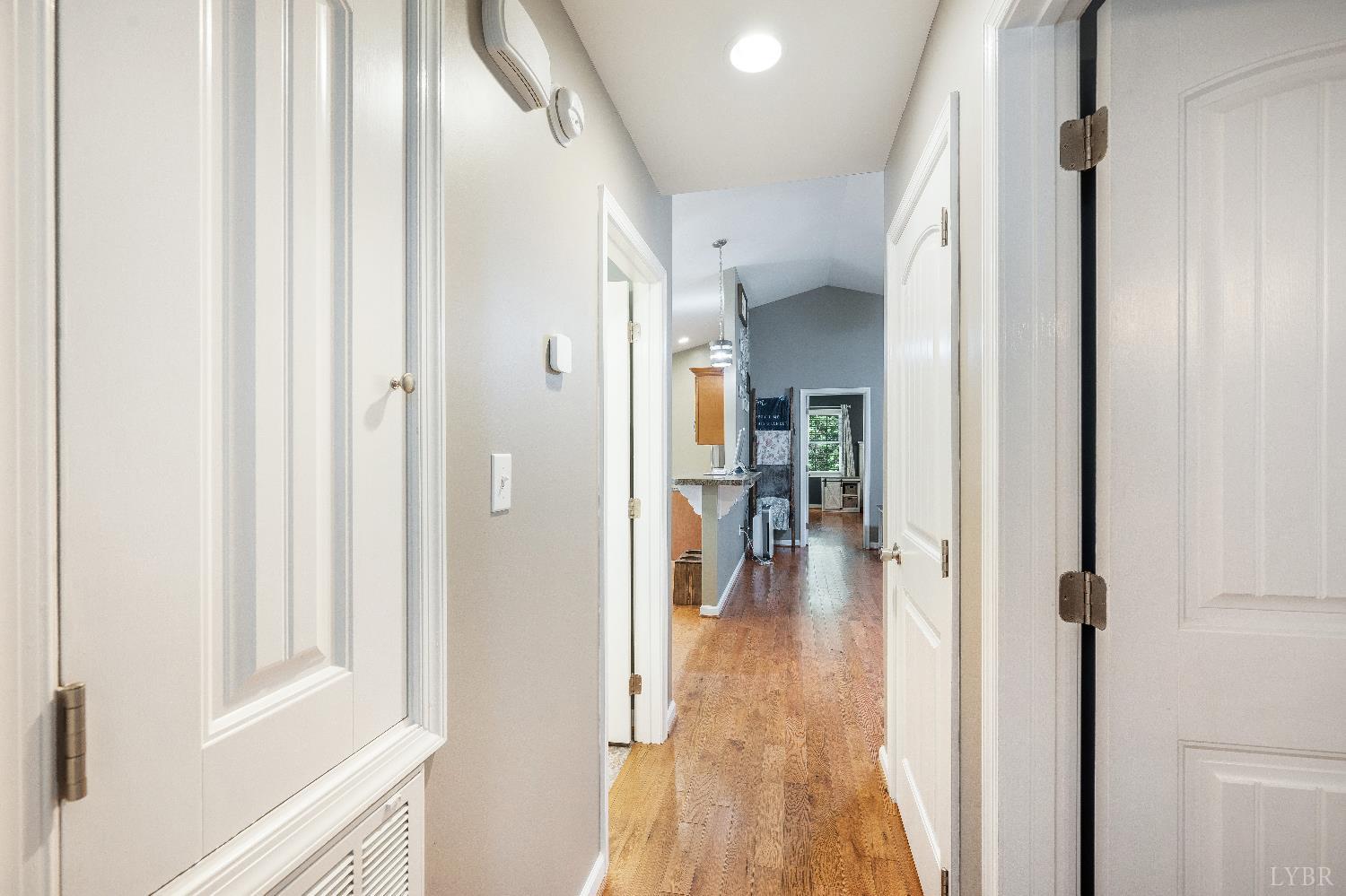 405 Marston Street Spout Spring, VA 24593 - Photo 24 of 58 a view of a hallway with wooden floor windows and livingroom