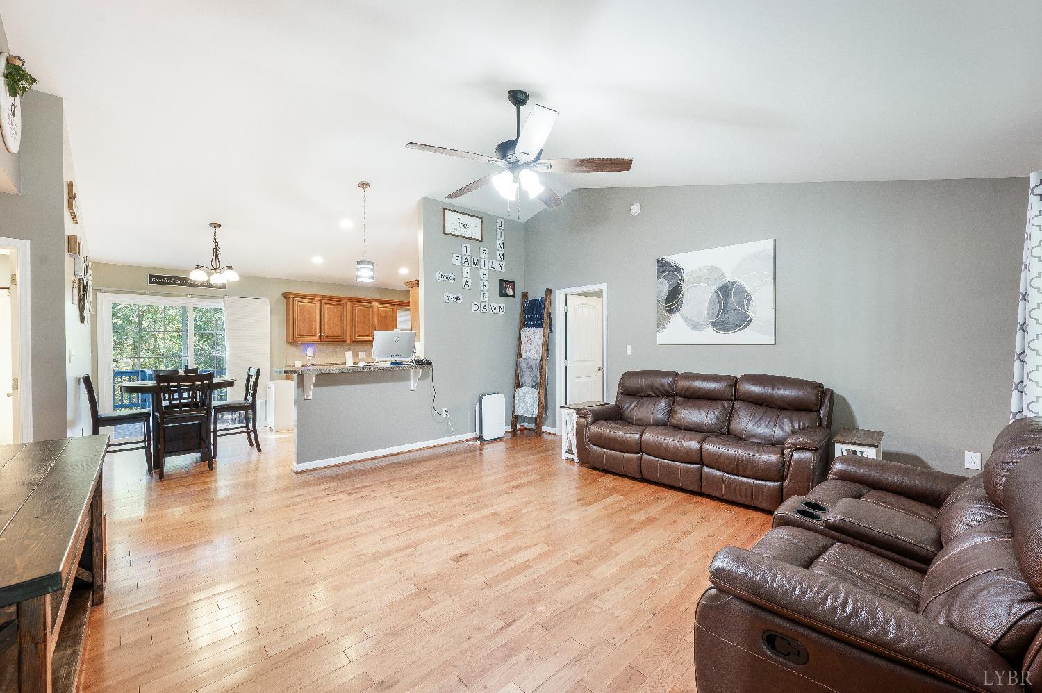 405 Marston Street Spout Spring, VA 24593 - Photo 4 of 58 a living room with furniture and kitchen view