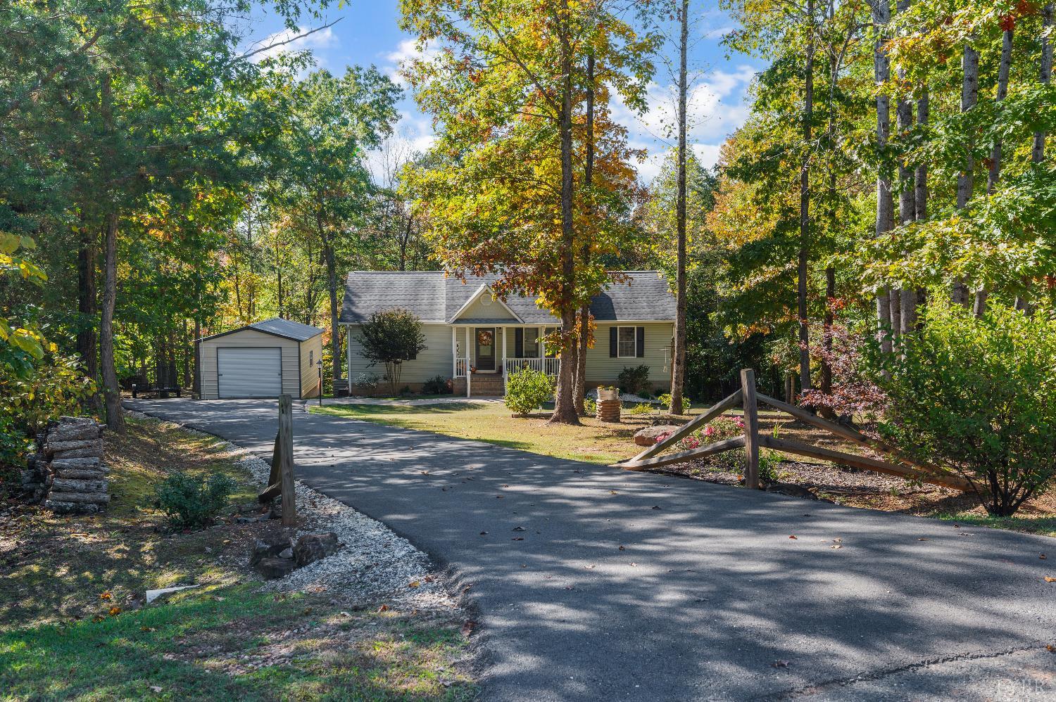 405 Marston Street Spout Spring, VA 24593 - Photo 45 of 58 a view of a house with backyard and sitting area