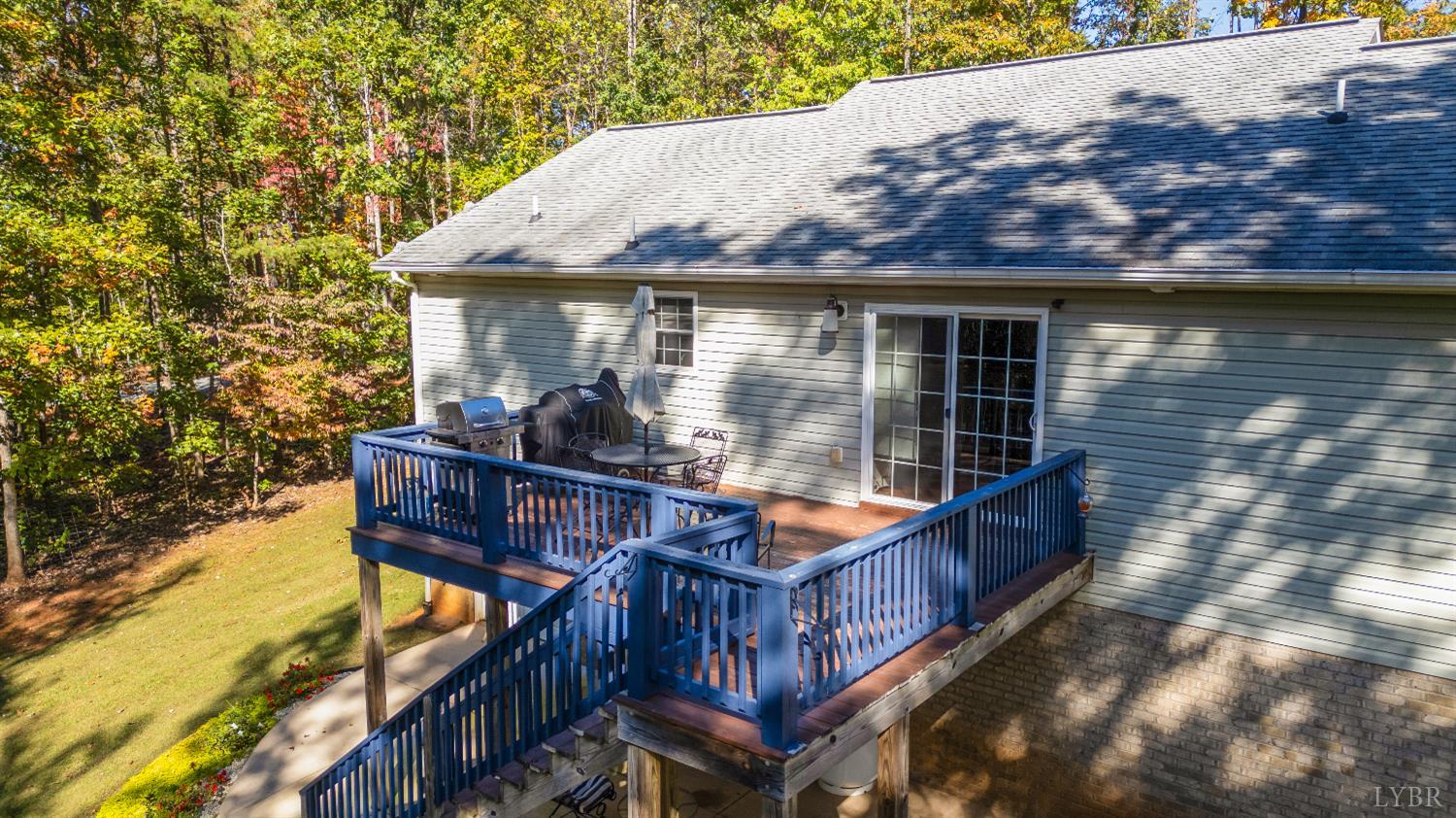 405 Marston Street Spout Spring, VA 24593 - Photo 48 of 58 a view of a wooden chairs on the deck