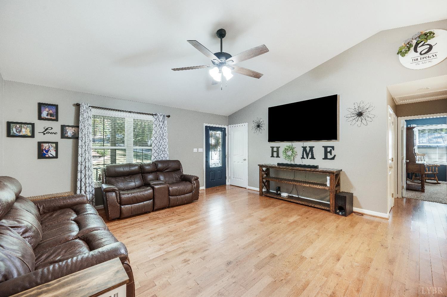 405 Marston Street Spout Spring, VA 24593 - Photo 5 of 58 a living room with furniture and a flat screen tv
