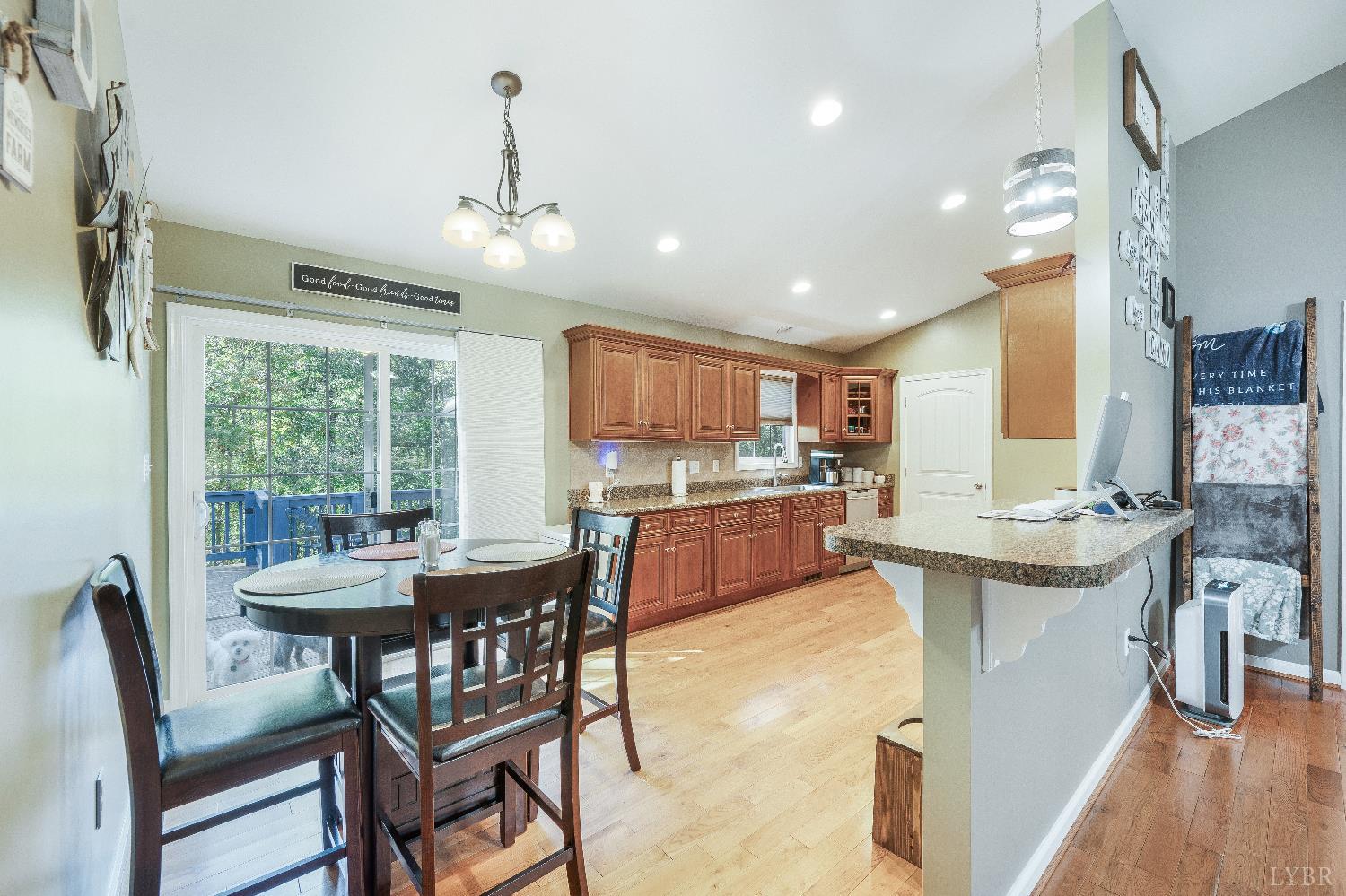 405 Marston Street Spout Spring, VA 24593 - Photo 6 of 58 a view of a dining room with furniture window and wooden floor