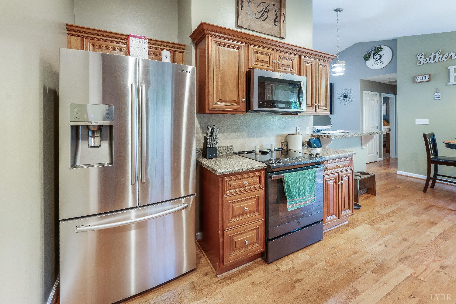 405 Marston Street Spout Spring, VA 24593 - Photo 10 of 58 a kitchen with stainless steel appliances granite countertop a refrigerator stove and sink