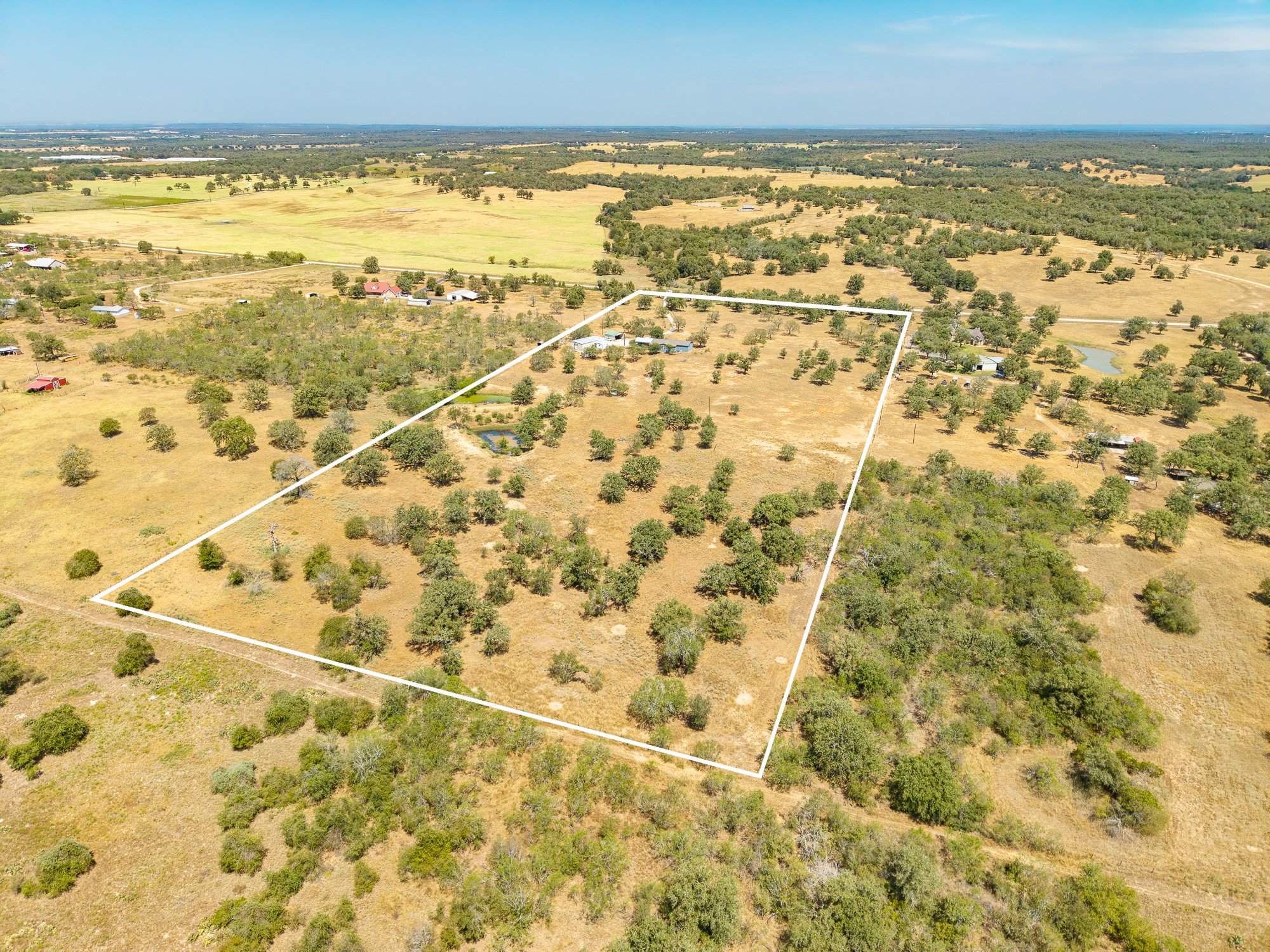 1951 Dowdy Road Seguin, TX 78155 - Photo 36 of 40 Mature trees and open pastures define this spacious acreage offering endless country possibilities.