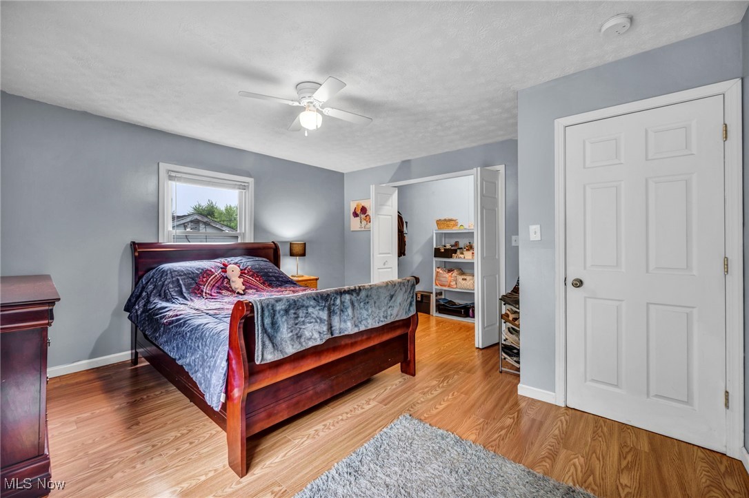 3954 Homestead Road Ravenna, OH 44266 - Photo 23 of 46 Bedroom with wood finished floors and a ceiling fan