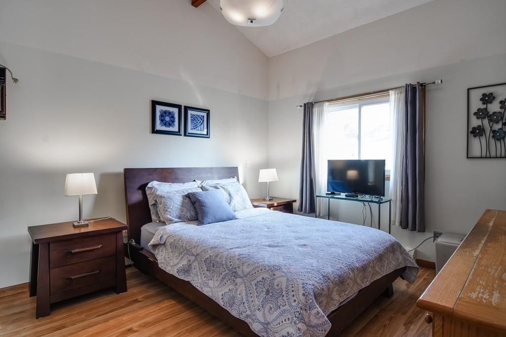 2 Lamplight Circle Natick, MA 01760 - Photo 14 of 23 a bedroom with a bed and a tv