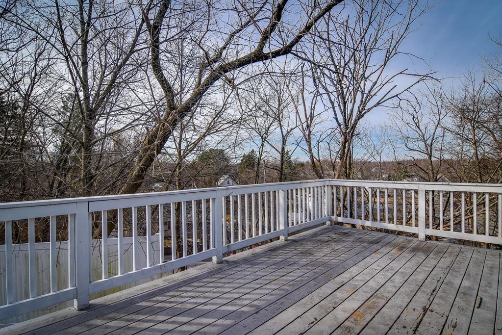 2 Lamplight Circle Natick, MA 01760 - Photo 22 of 23 a view of wooden deck and a trees