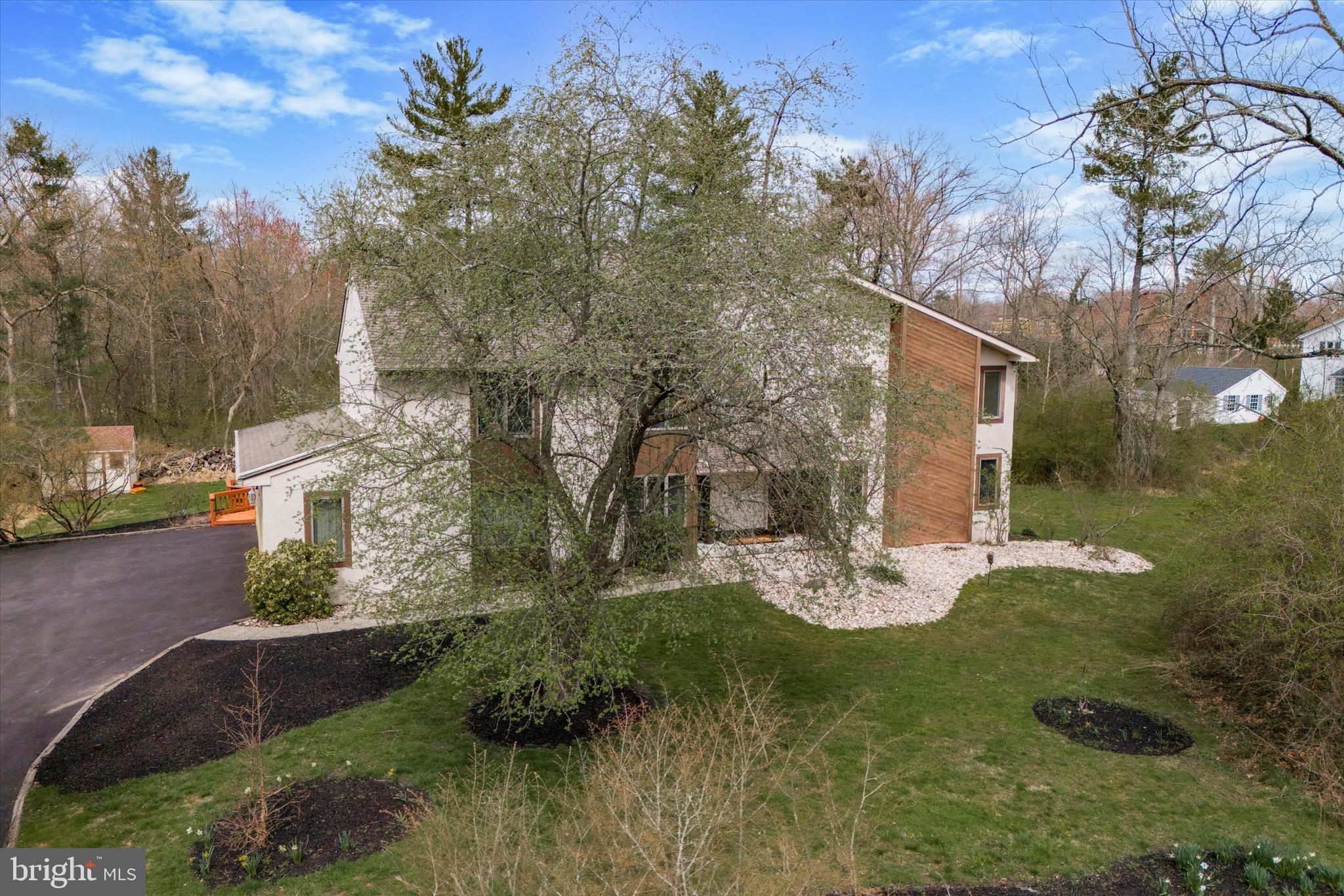 1000 Stonebridge Road Lower Gwynedd, PA 19002 - Photo 4 of 67 a view of a garden with a house