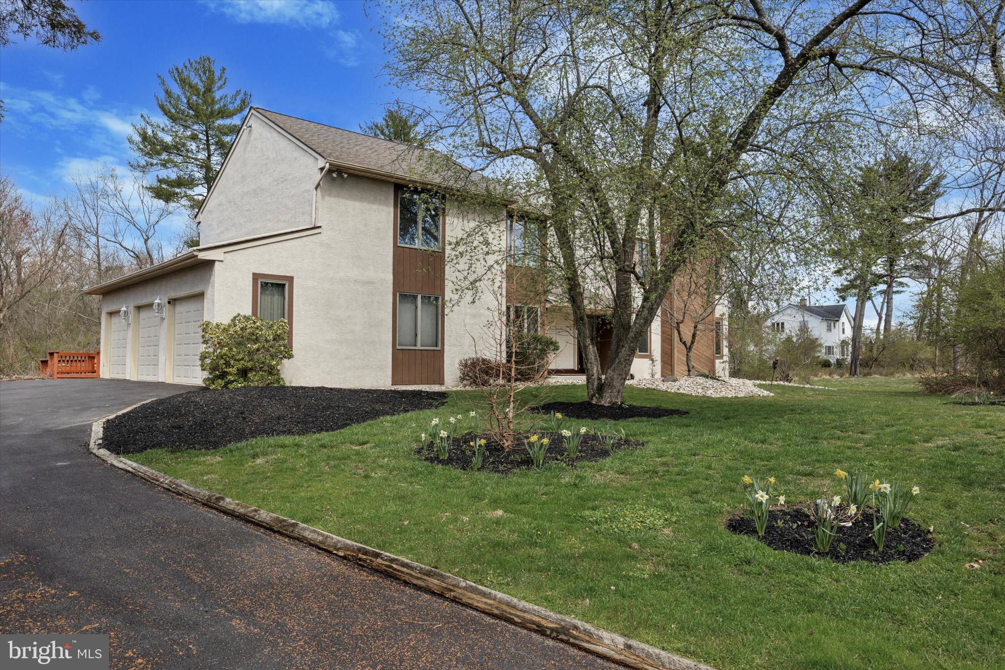 1000 Stonebridge Road Lower Gwynedd, PA 19002 - Photo 5 of 67 a view of a house with backyard and garden