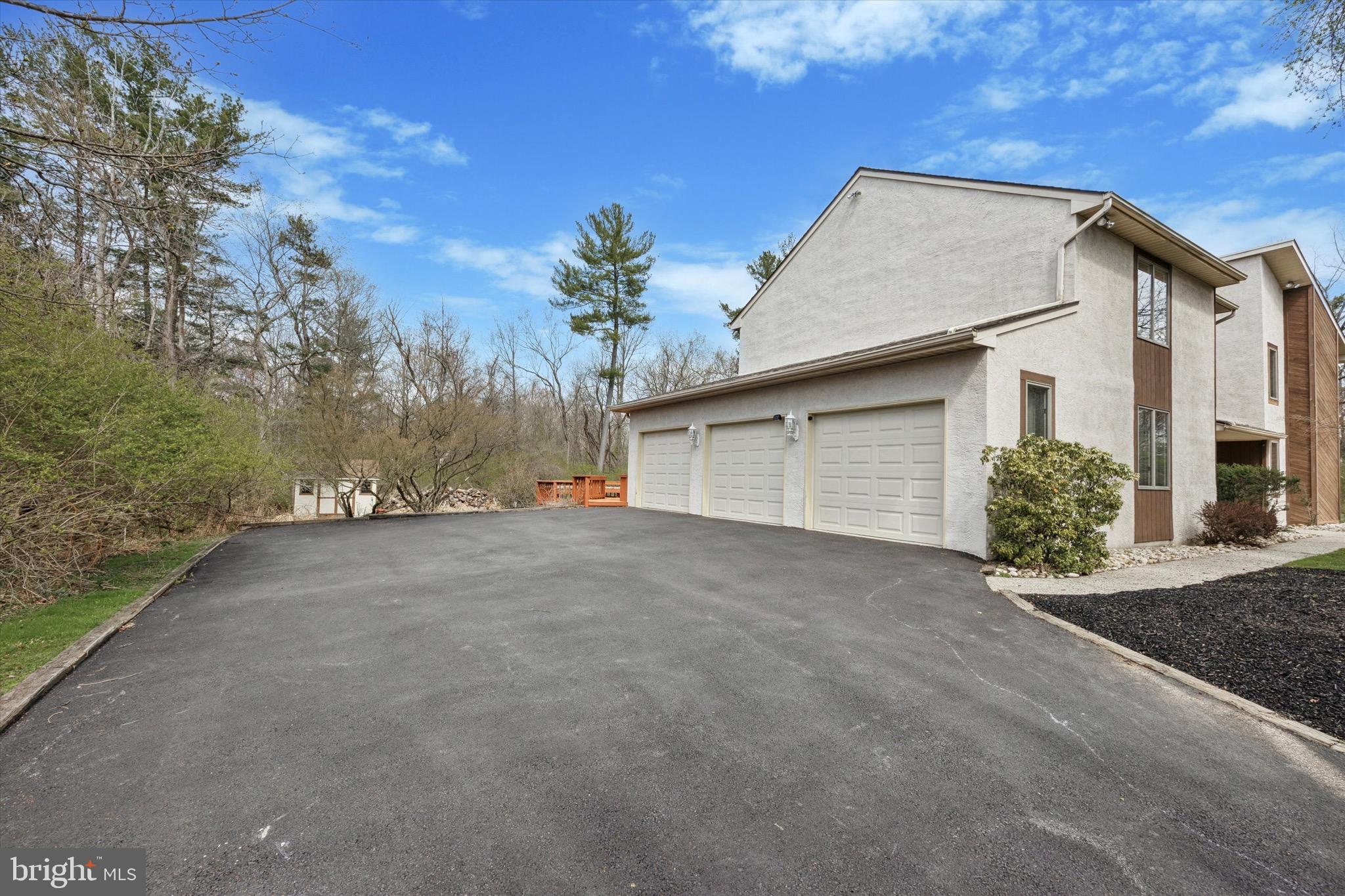 1000 Stonebridge Road Lower Gwynedd, PA 19002 - Photo 6 of 67 a view of a house with a outdoor space