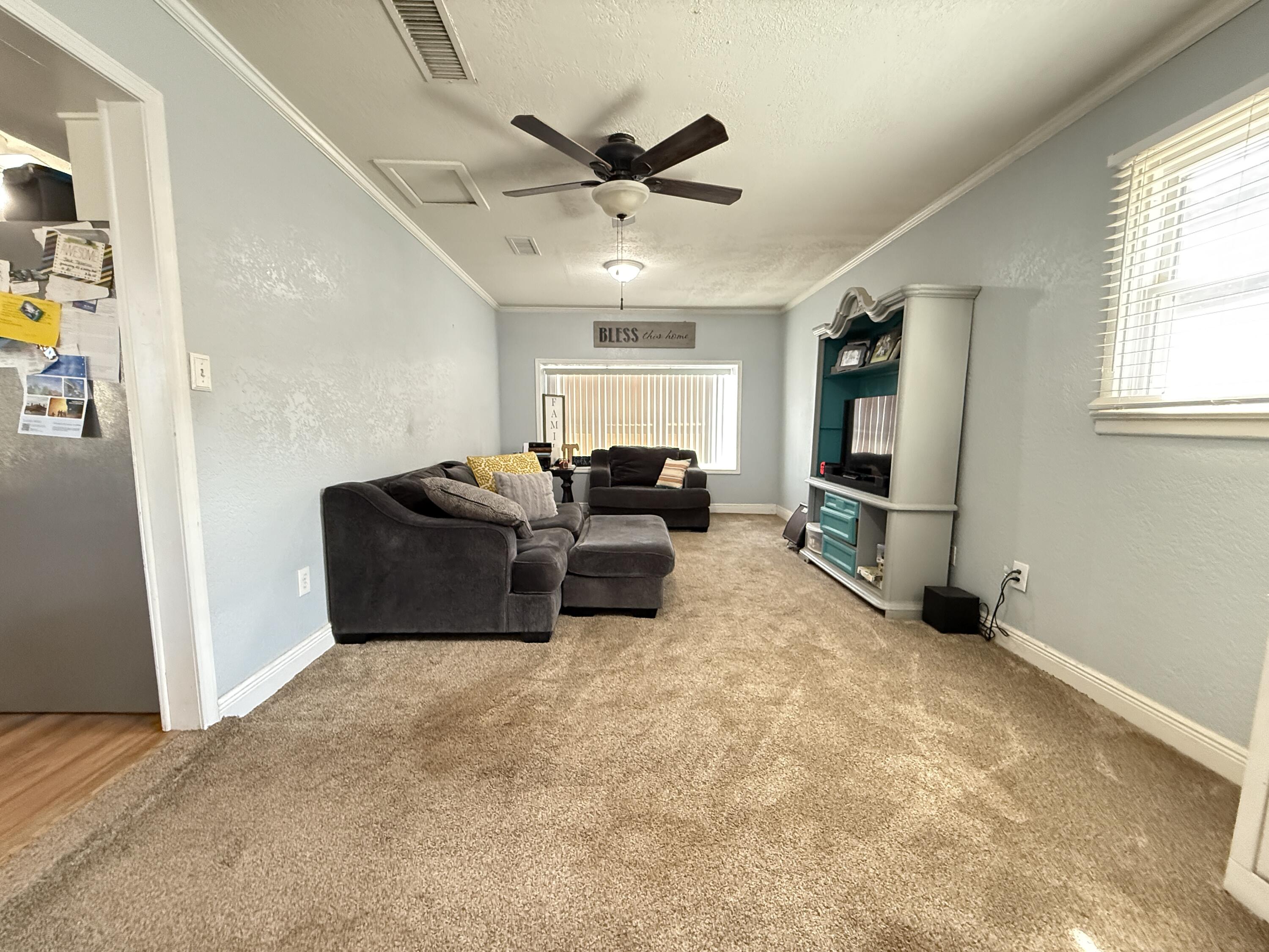 1006 West 11th Street Post, TX 79356 - Photo 16 of 39 a living room with furniture
