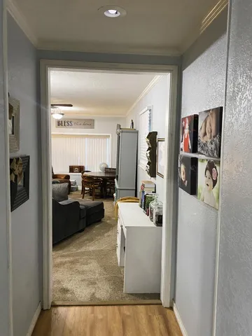 a view of a livingroom with furniture and a fireplace