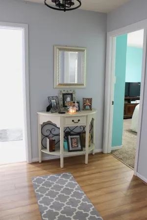 a view of a bathroom with sink and mirror