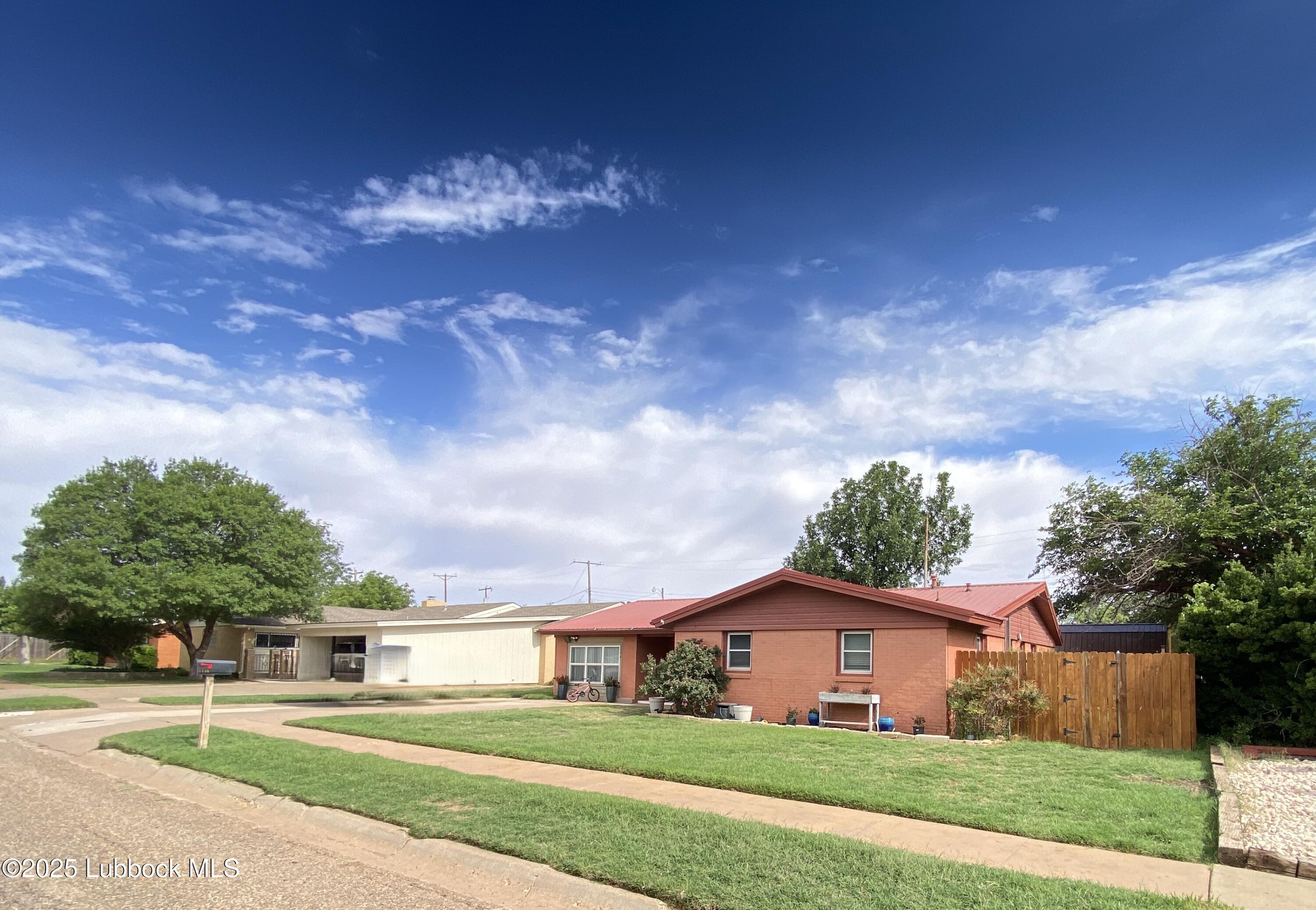 1006 West 11th Street Post, TX 79356 - Photo 2 of 39 a view of big house with a big yard
