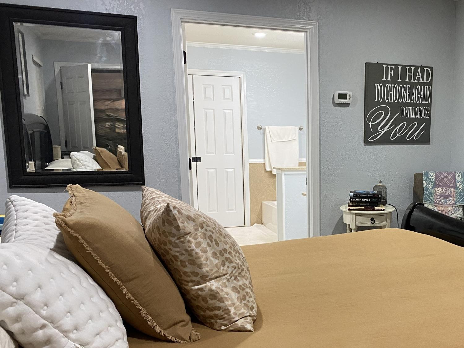 1006 West 11th Street Post, TX 79356 - Photo 21 of 39 a bedroom with a bed and a dresser