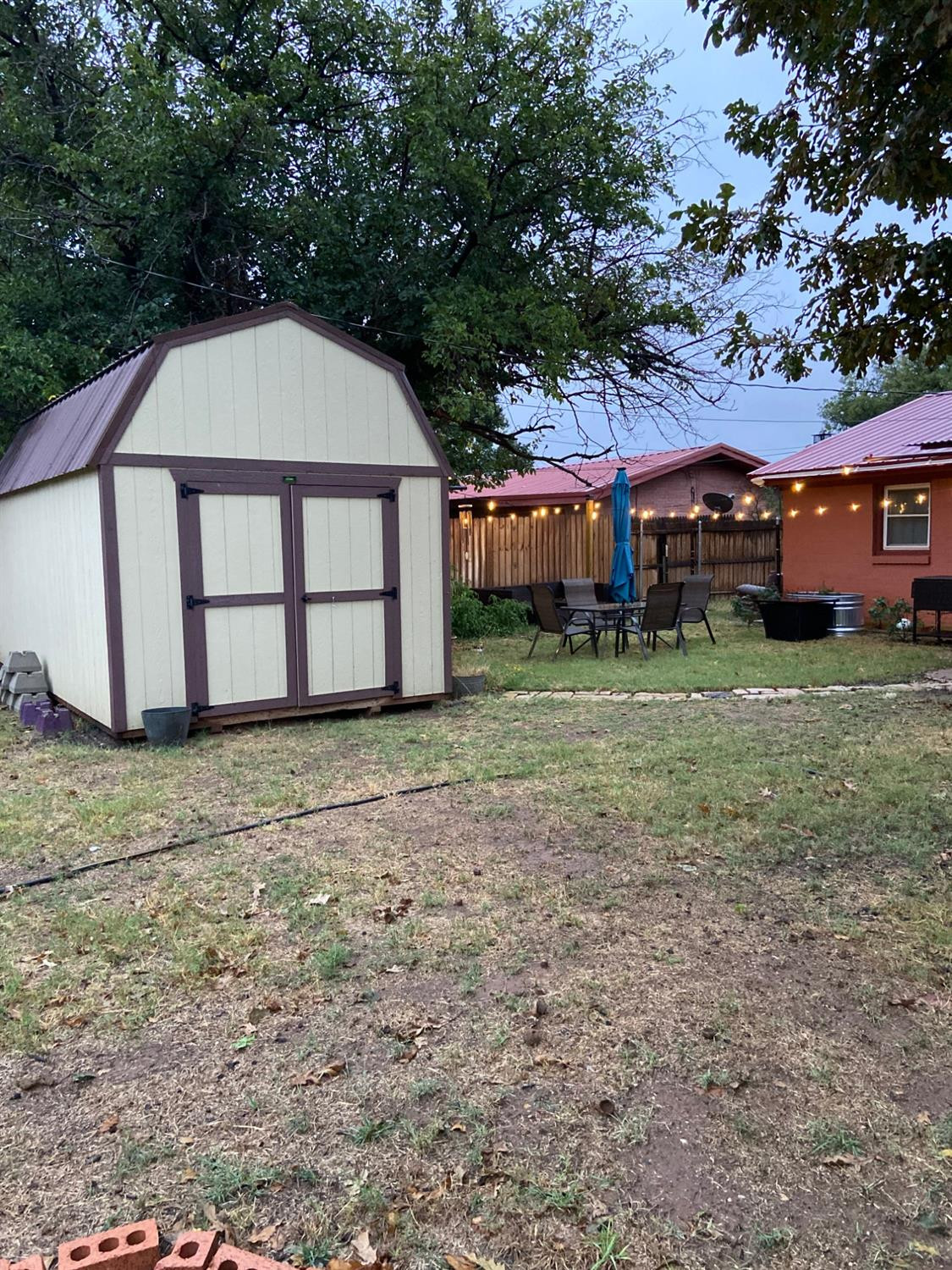1006 West 11th Street Post, TX 79356 - Photo 36 of 39 a view of a house with a yard