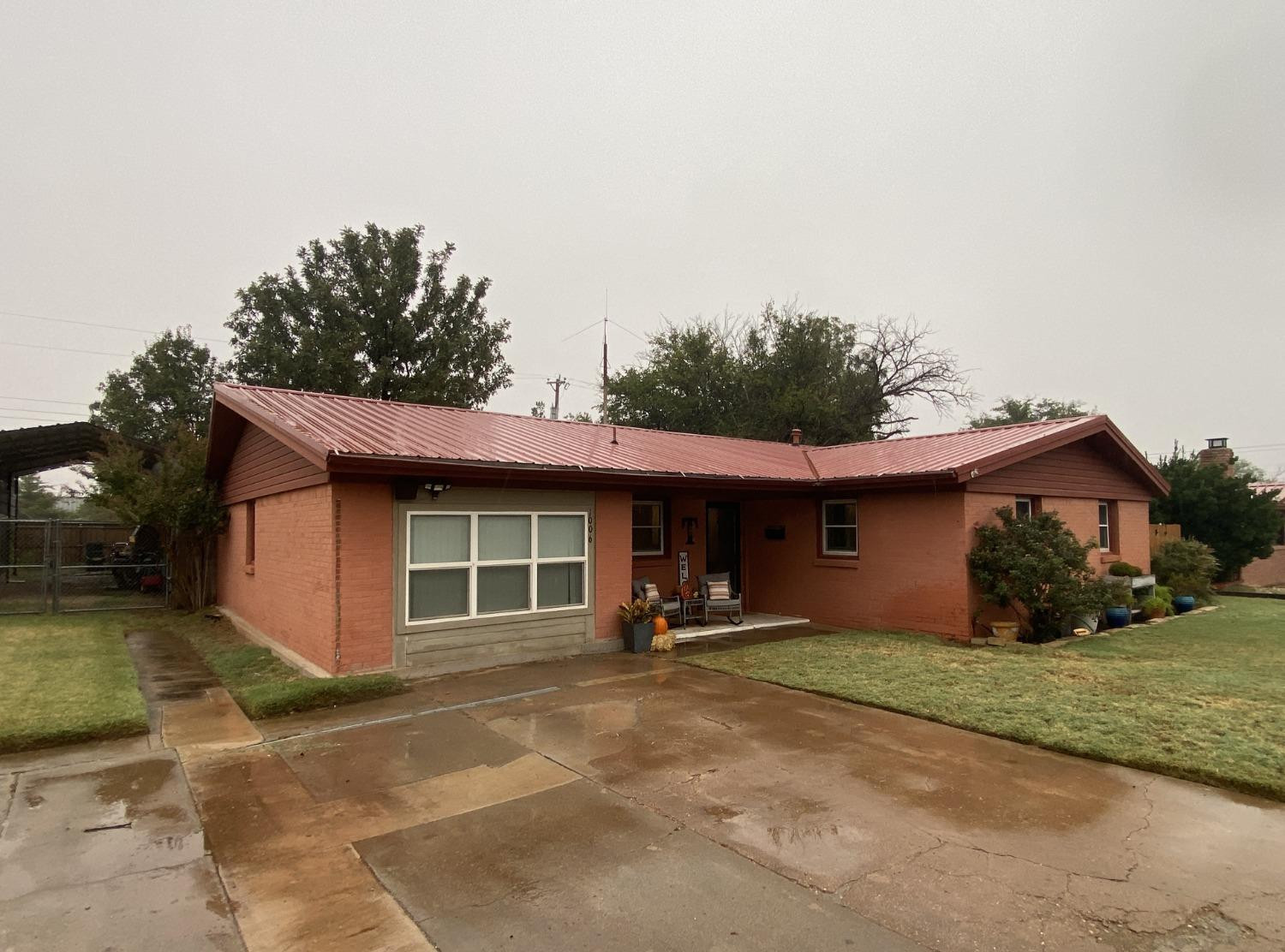 1006 West 11th Street Post, TX 79356 - Photo 38 of 39 a view of a house with backyard and trees