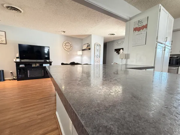 a view of a living room and dining room