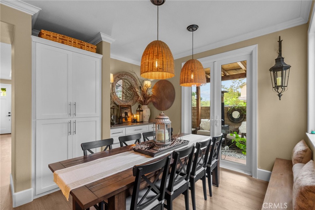 19969 Via Joyce Drive Saugus, CA 91350 - Photo 14 of 66 a view of a dining room with furniture window and wooden floor