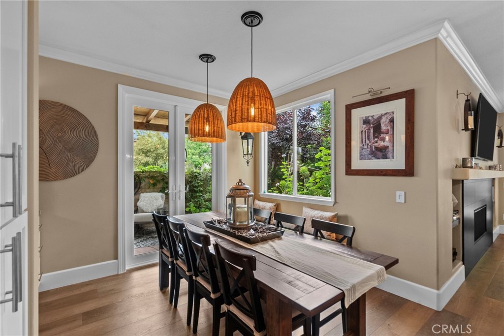 19969 Via Joyce Drive Saugus, CA 91350 - Photo 16 of 66 a view of a dining room with furniture window and wooden floor