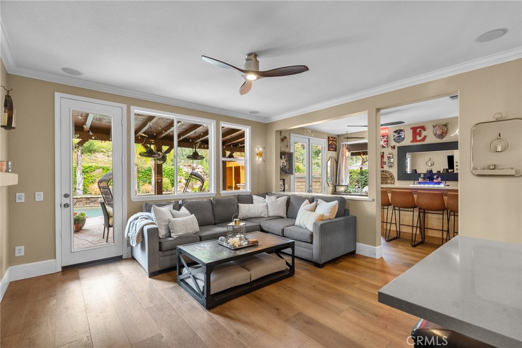 19969 Via Joyce Drive Saugus, CA 91350 - Photo 24 of 66 a living room with furniture and a large window