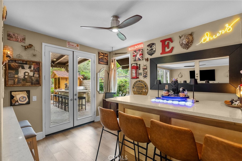 19969 Via Joyce Drive Saugus, CA 91350 - Photo 25 of 66 a view of a dining room with furniture window and outside view