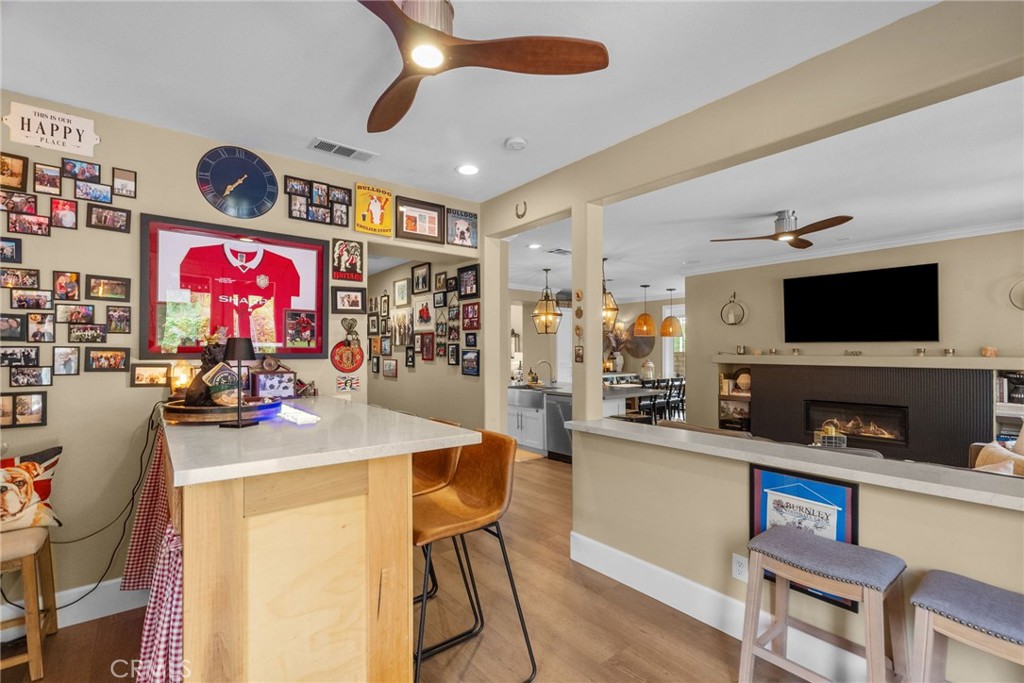 19969 Via Joyce Drive Saugus, CA 91350 - Photo 29 of 66 a kitchen with stainless steel appliances granite countertop a sink and cabinets