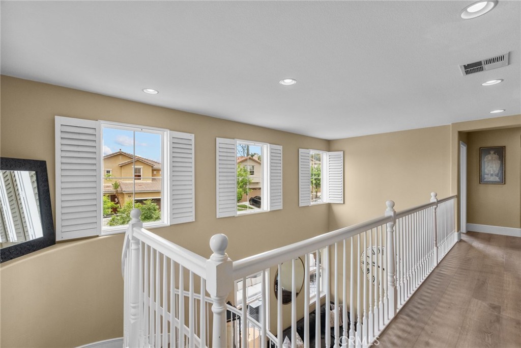 19969 Via Joyce Drive Saugus, CA 91350 - Photo 33 of 66 a view of an entryway with wooden floor and windows