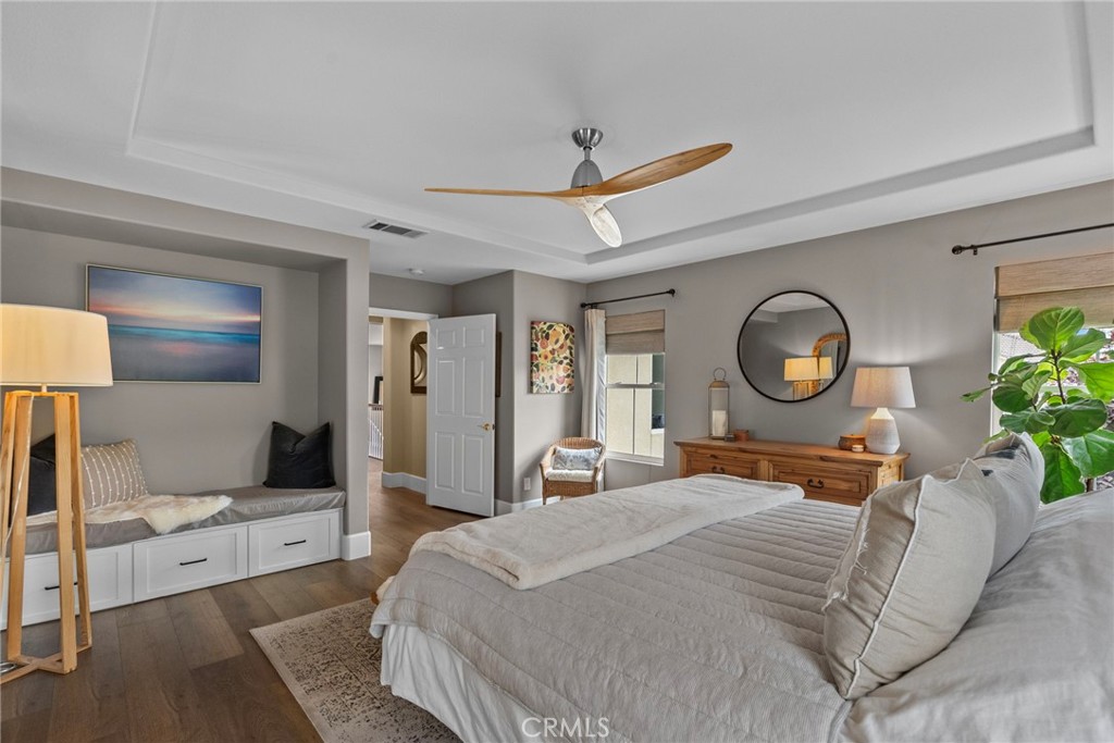 19969 Via Joyce Drive Saugus, CA 91350 - Photo 40 of 66 a bedroom with a bed mirror and window