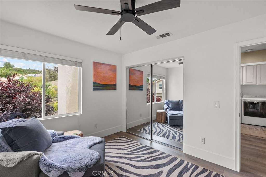 19969 Via Joyce Drive Saugus, CA 91350 - Photo 52 of 66 a bedroom with furniture and a window