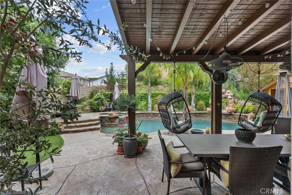 19969 Via Joyce Drive Saugus, CA 91350 - Photo 58 of 66 a view of a porch with furniture and a backyard