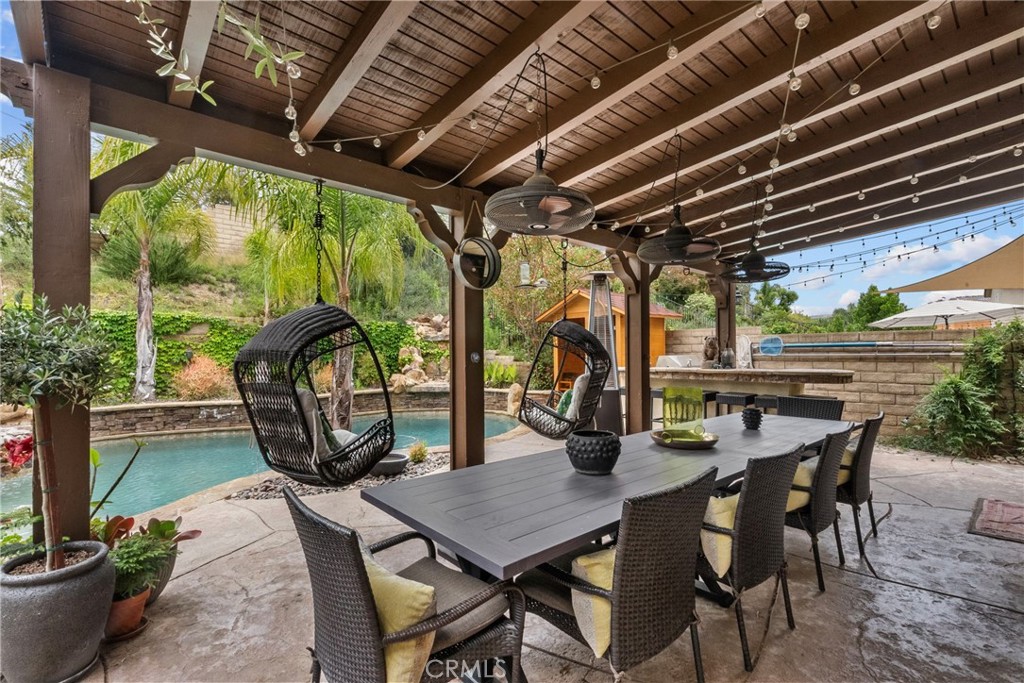 19969 Via Joyce Drive Saugus, CA 91350 - Photo 59 of 66 a view of a porch with furniture and a grill